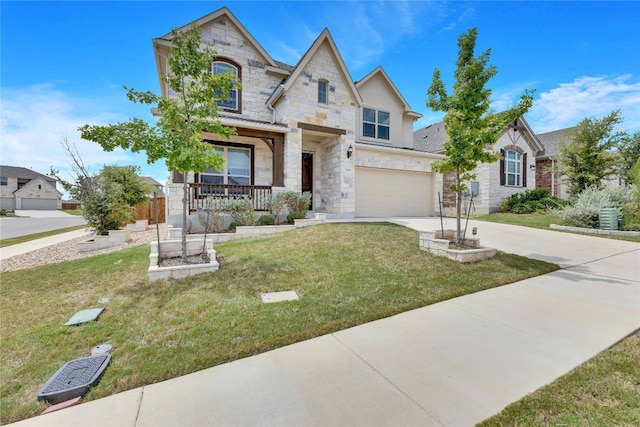 view of front of house with a garage and a front yard