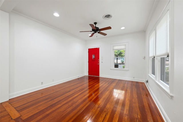 unfurnished living room with ceiling fan, ornamental molding, and hardwood / wood-style floors