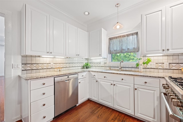 kitchen with appliances with stainless steel finishes, sink, white cabinetry, and dark hardwood / wood-style floors