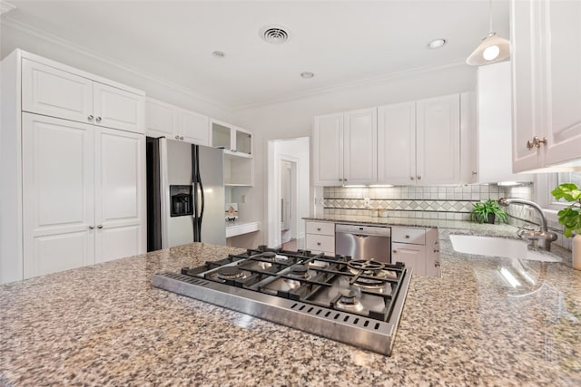 kitchen with white cabinets, stainless steel appliances, and sink