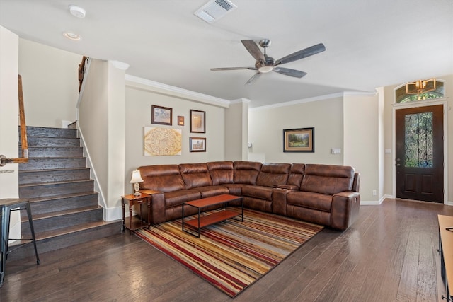 living room with crown molding, dark wood-type flooring, and ceiling fan