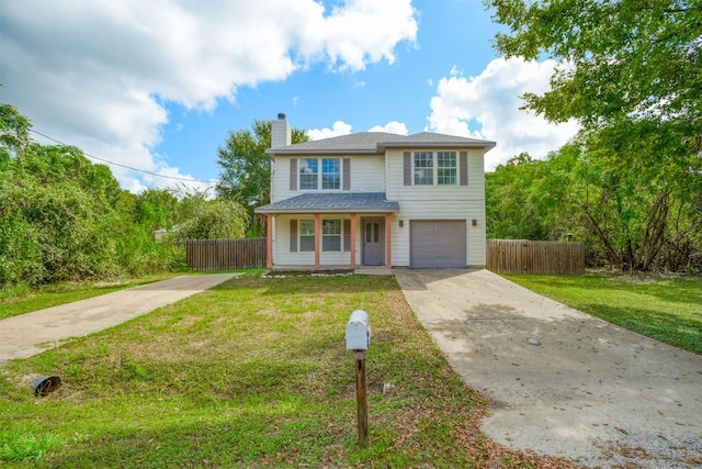 view of property with a front yard, a porch, and a garage