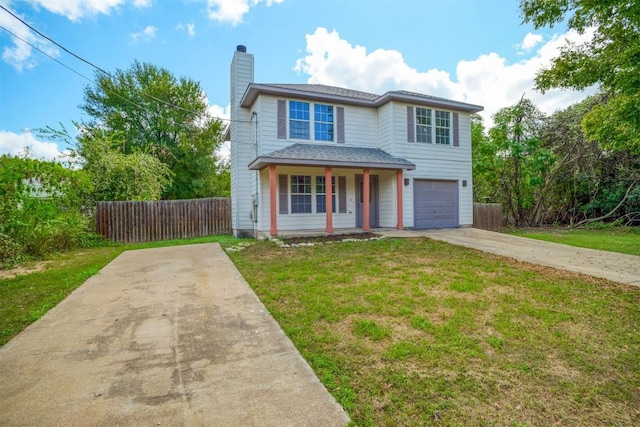 view of property with a porch, a garage, and a front yard