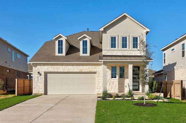 view of front facade featuring a garage and a front yard