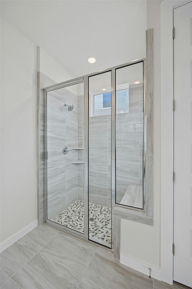 bathroom featuring walk in shower