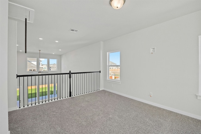 spare room featuring carpet floors