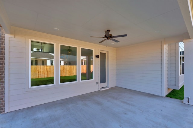 view of patio / terrace featuring ceiling fan