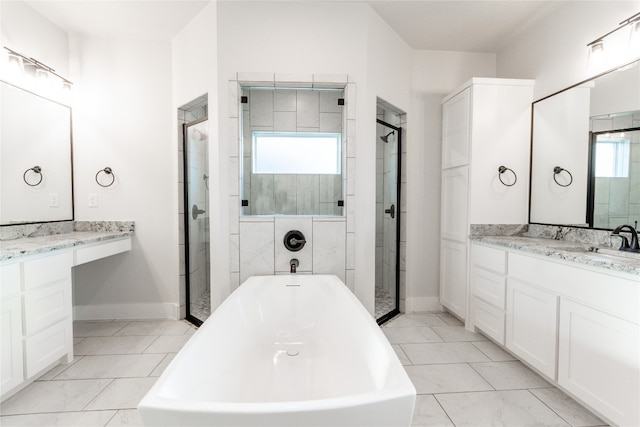 bathroom featuring vanity, tile patterned flooring, and separate shower and tub