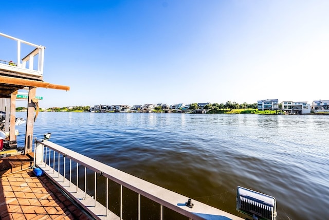 dock area with a water view