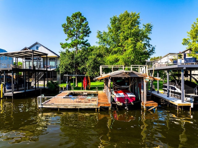 dock area featuring a water view