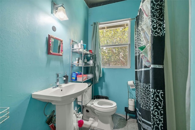 bathroom featuring toilet