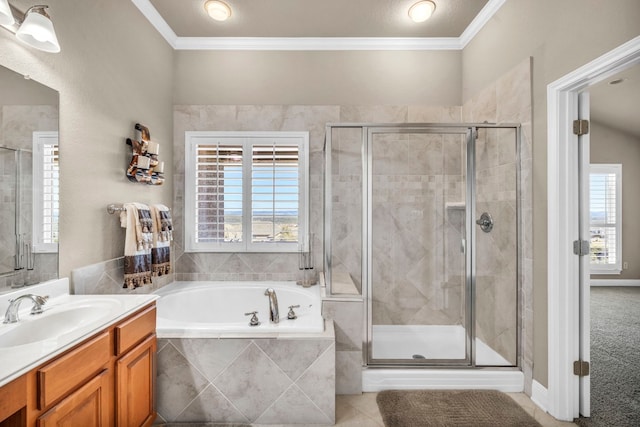 bathroom featuring shower with separate bathtub, crown molding, vanity, and tile patterned flooring