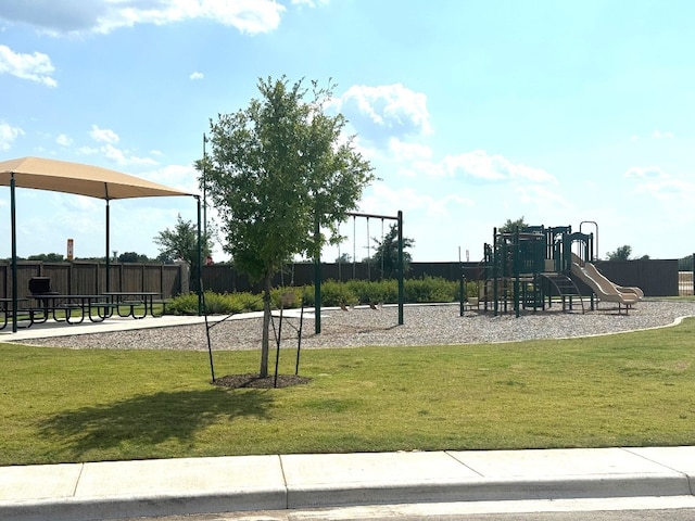 view of play area with a yard