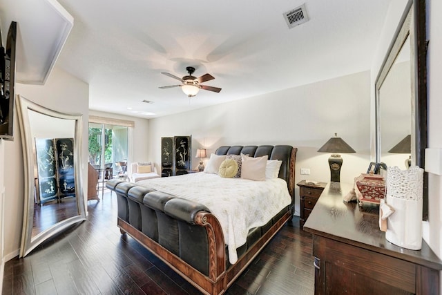 bedroom featuring dark hardwood / wood-style floors and ceiling fan