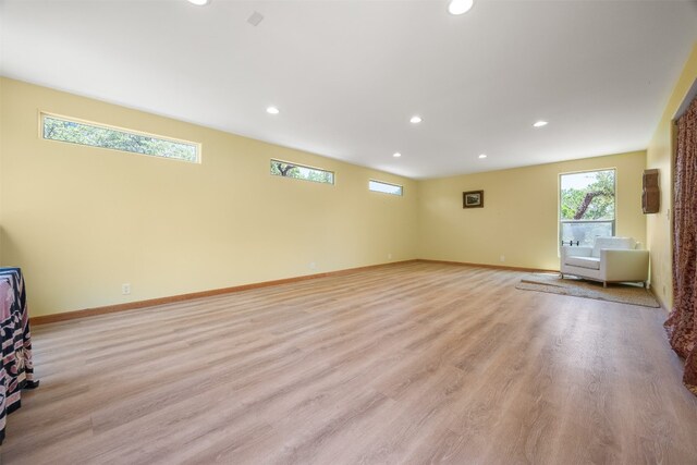 9000 Bear Creek Dr, Austin, TX 78737 - basement featuring recessed lighting, light wood-style flooring, and baseboards