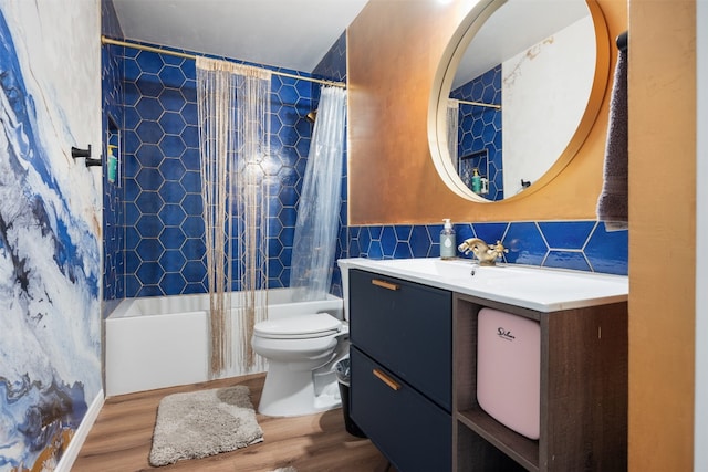 full bathroom featuring shower / tub combo with curtain, toilet, wood-type flooring, vanity, and backsplash