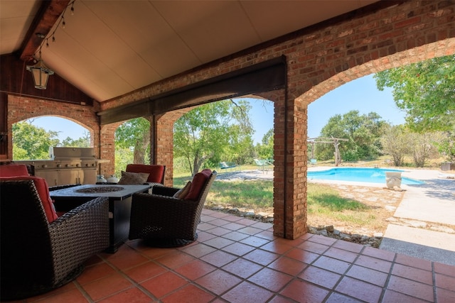 9000 Bear Creek Dr, Austin, TX 78737 - view of patio with an outdoor fire pit, an outdoor pool, and area for grilling