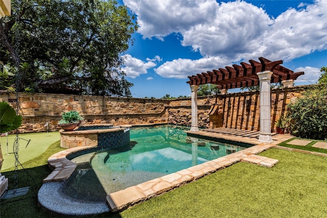 view of swimming pool with an in ground hot tub and a lawn