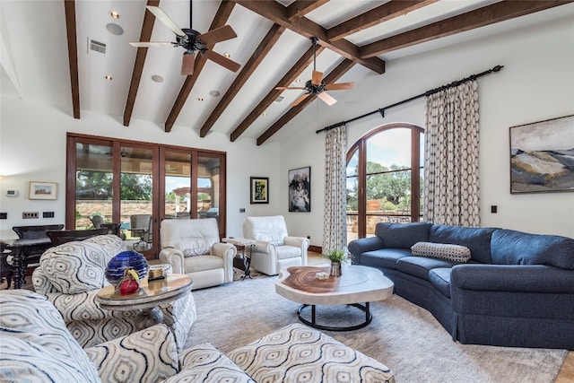 living room featuring beam ceiling, ceiling fan, and high vaulted ceiling