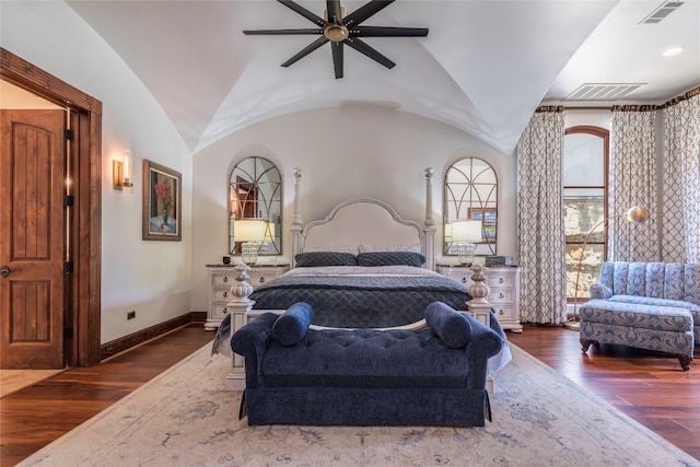 bedroom with ceiling fan, dark hardwood / wood-style flooring, and lofted ceiling