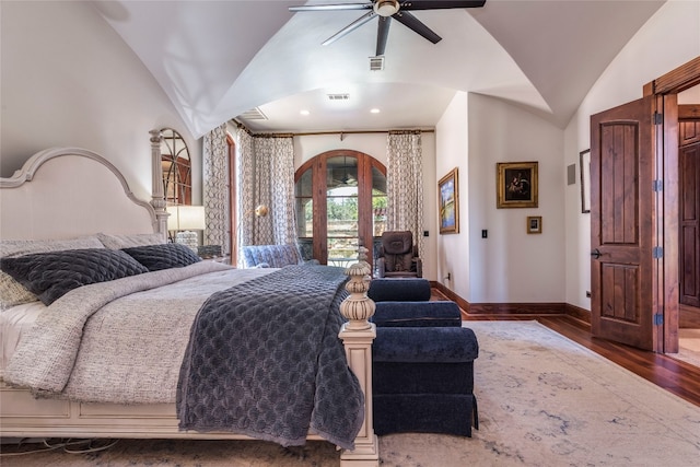 bedroom featuring ceiling fan, wood-type flooring, vaulted ceiling, and access to outside