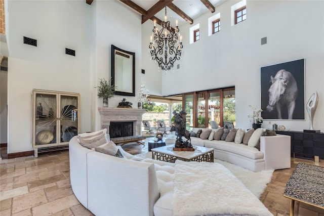 living room featuring an inviting chandelier, beamed ceiling, light tile patterned floors, and a high ceiling