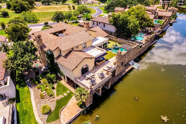 drone / aerial view with a water view