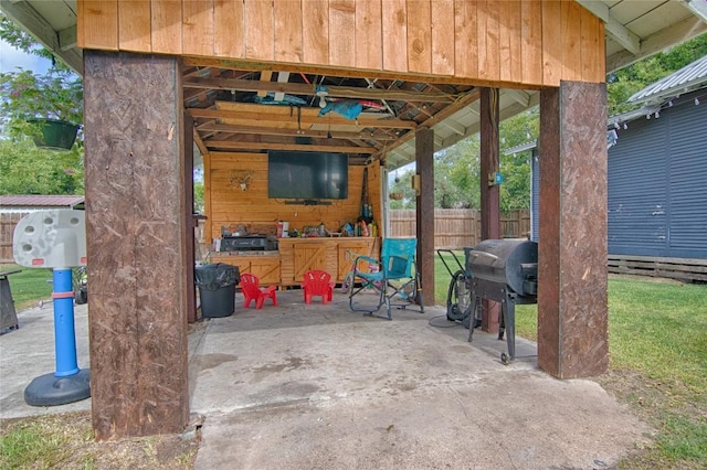 view of patio / terrace with fence and area for grilling