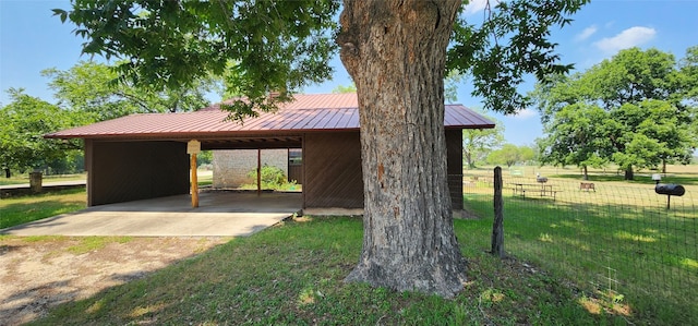 exterior space featuring a front lawn