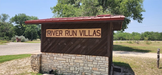 view of community sign