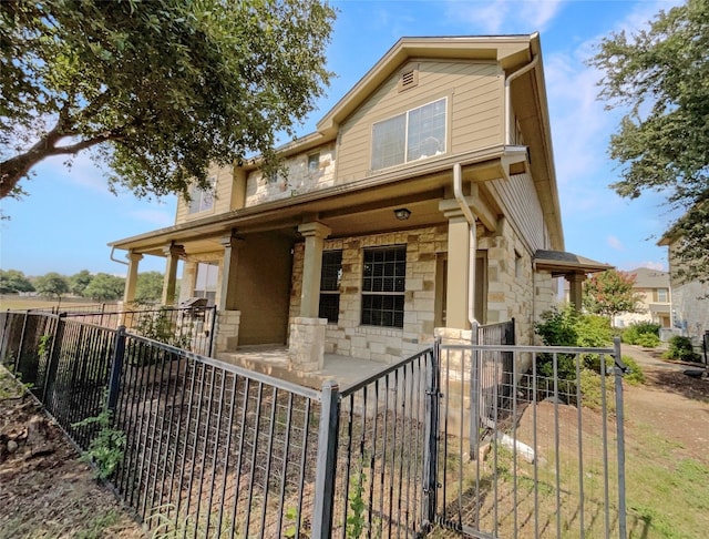 view of front of home featuring covered porch