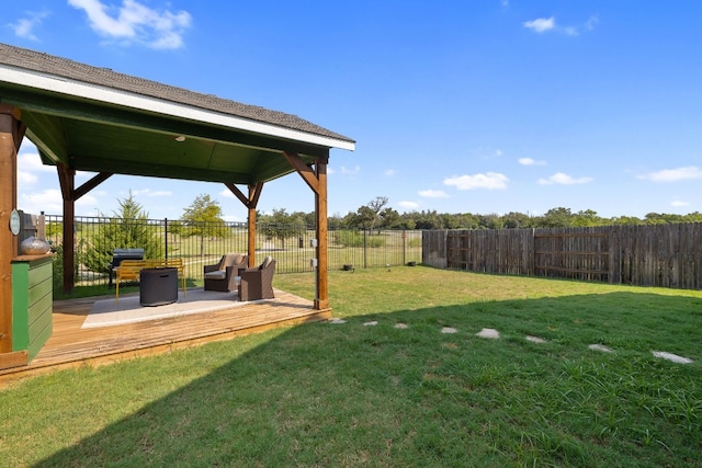 view of yard with a wooden deck