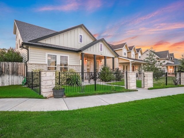 craftsman-style house featuring a yard