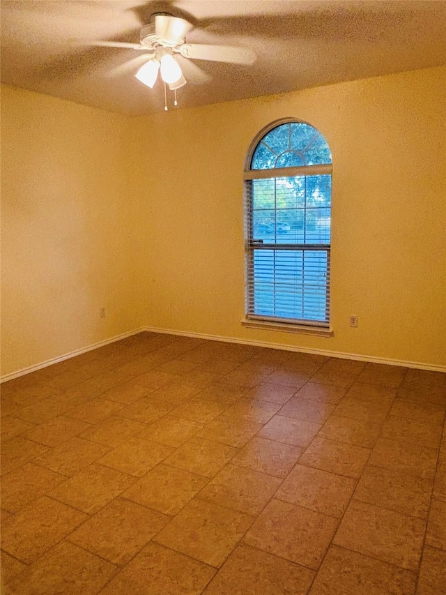 empty room with ceiling fan