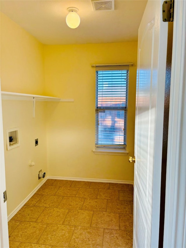 laundry area featuring hookup for an electric dryer, gas dryer hookup, and washer hookup