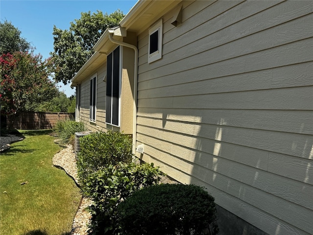 view of home's exterior featuring a yard