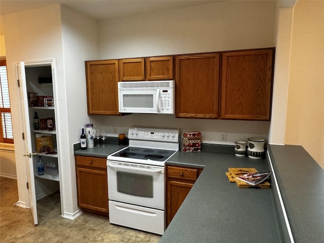 kitchen featuring white appliances