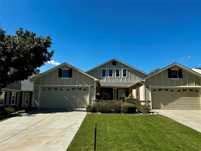 view of front of house with a garage and a front yard