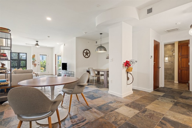 dining room featuring ceiling fan