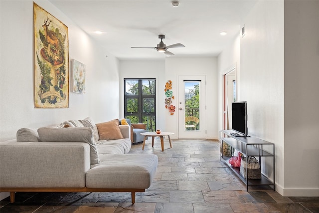 living room with ceiling fan