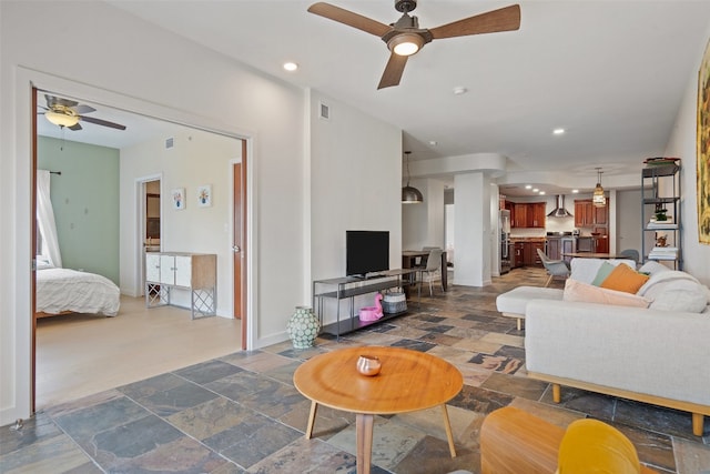 living room with ceiling fan