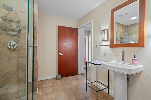 bathroom featuring an enclosed shower