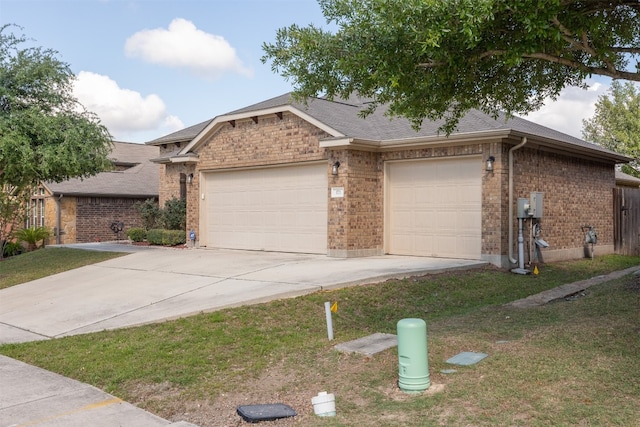 single story home with a garage