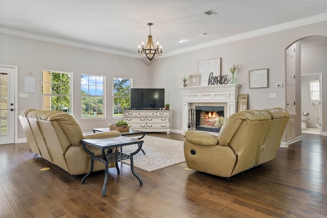 living room featuring crown molding and dark hardwood / wood-style flooring