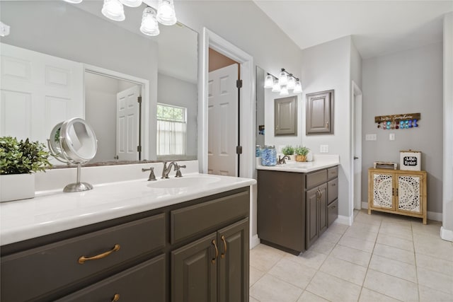 bathroom with vanity and tile patterned flooring