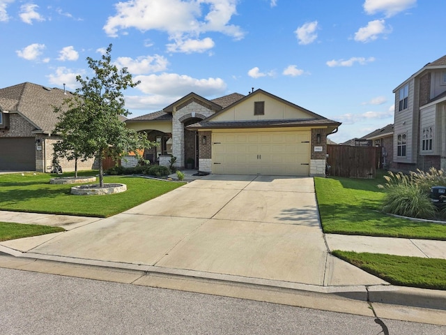 view of front facade featuring a garage and a front lawn