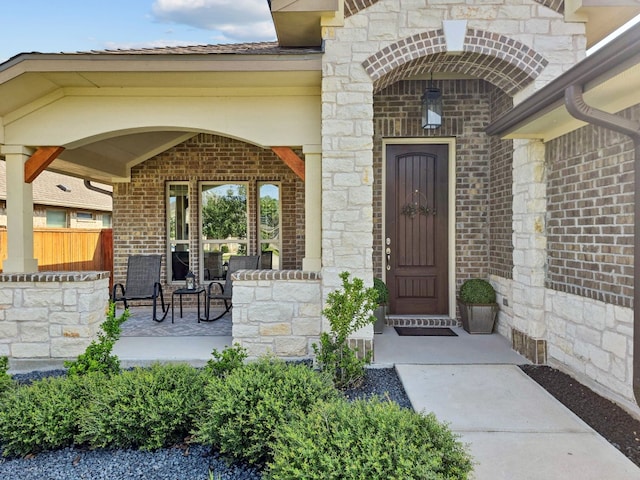 entrance to property with a porch