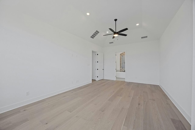 spare room featuring ceiling fan and light hardwood / wood-style floors