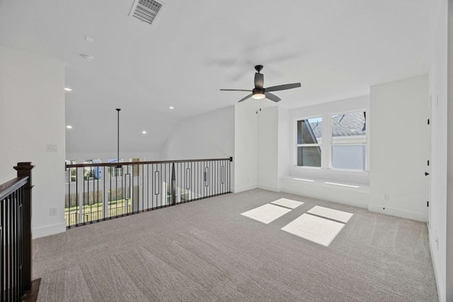 carpeted empty room with ceiling fan