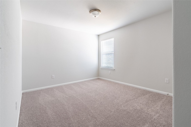 empty room featuring carpet flooring